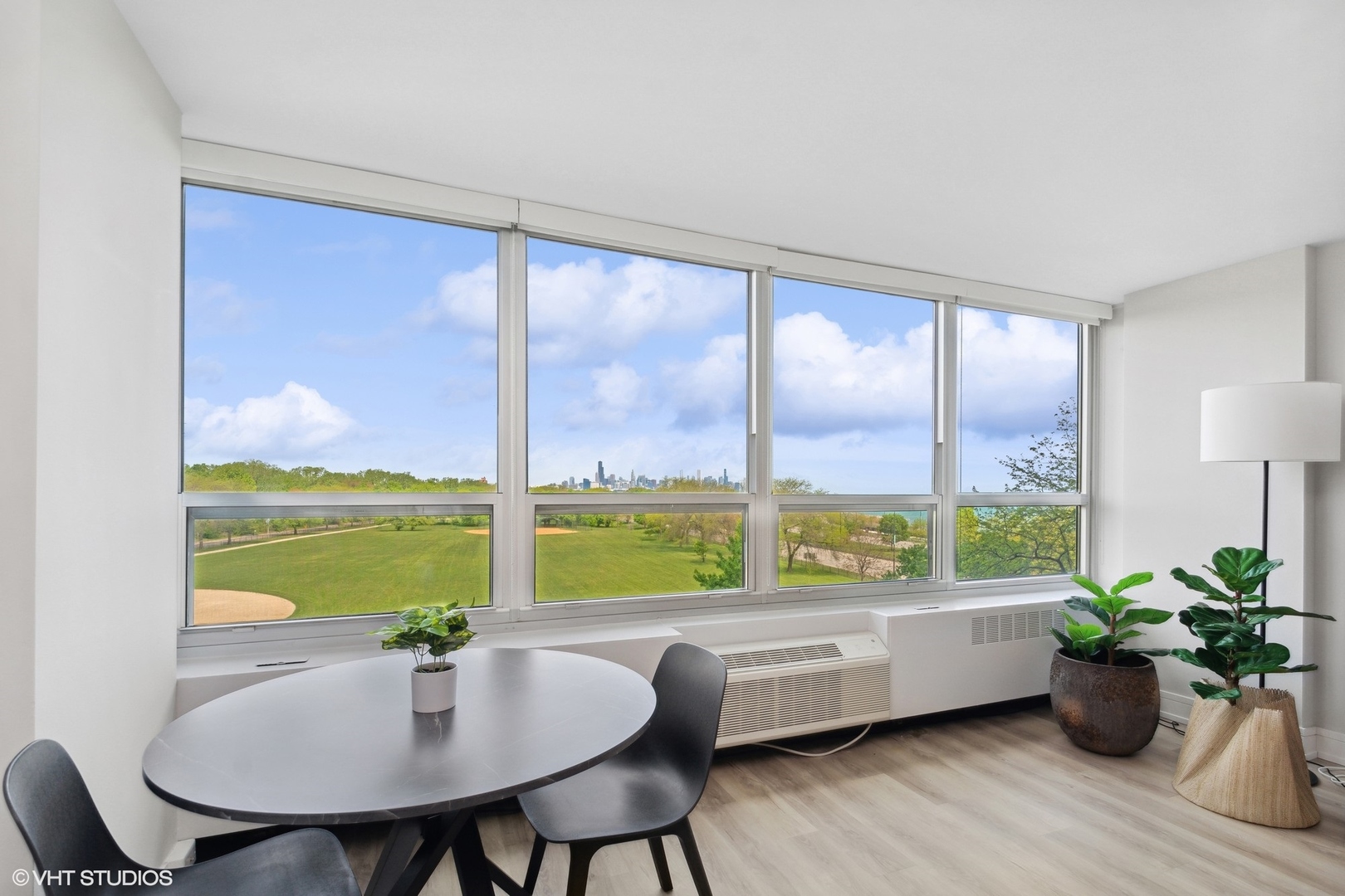 4800 South Chicago Beach Drive, Unit 503N Chicago, IL 60615 - Photo 9 of 15 a view of a dining room with furniture window and outside view