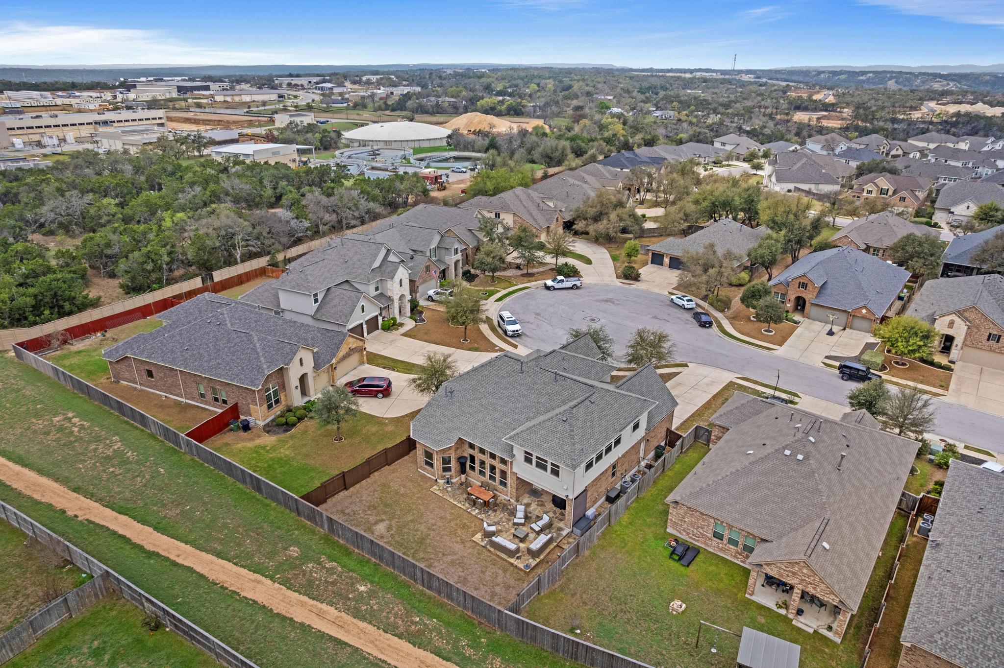 3028 Silvergrass Cove Leander, TX 78641 - Photo 35 of 38 Aerial view of property and surrounding area with nearby suburban area