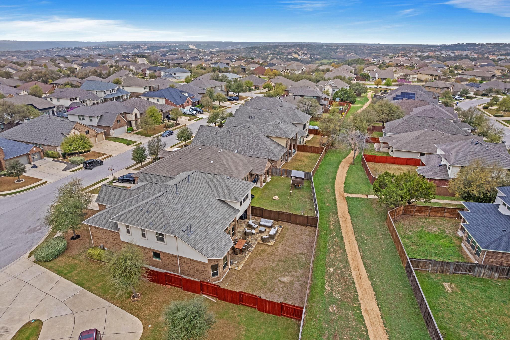 3028 Silvergrass Cove Leander, TX 78641 - Photo 37 of 38 Aerial perspective of suburban area