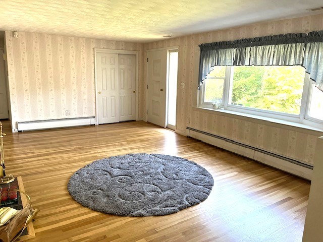 21 Chamberlain Road Chelmsford, MA 01824 - Photo 4 of 13 a view of an empty room and window