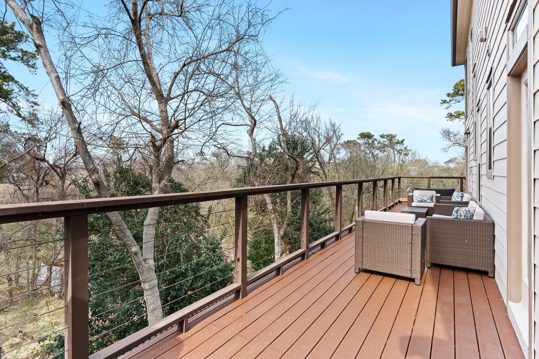 a view of roof deck with patio