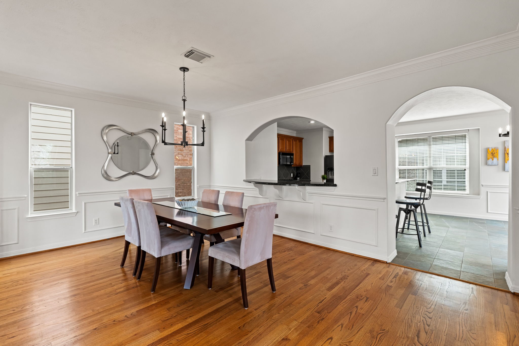 1846 Stacy Crest Houston, TX 77008 - Photo 11 of 32 a view of a dining room with furniture window and wooden floor