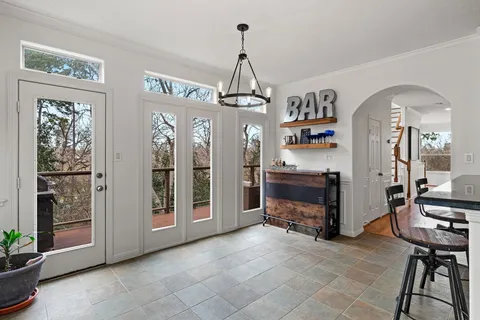 a view of a livingroom with furniture and windows