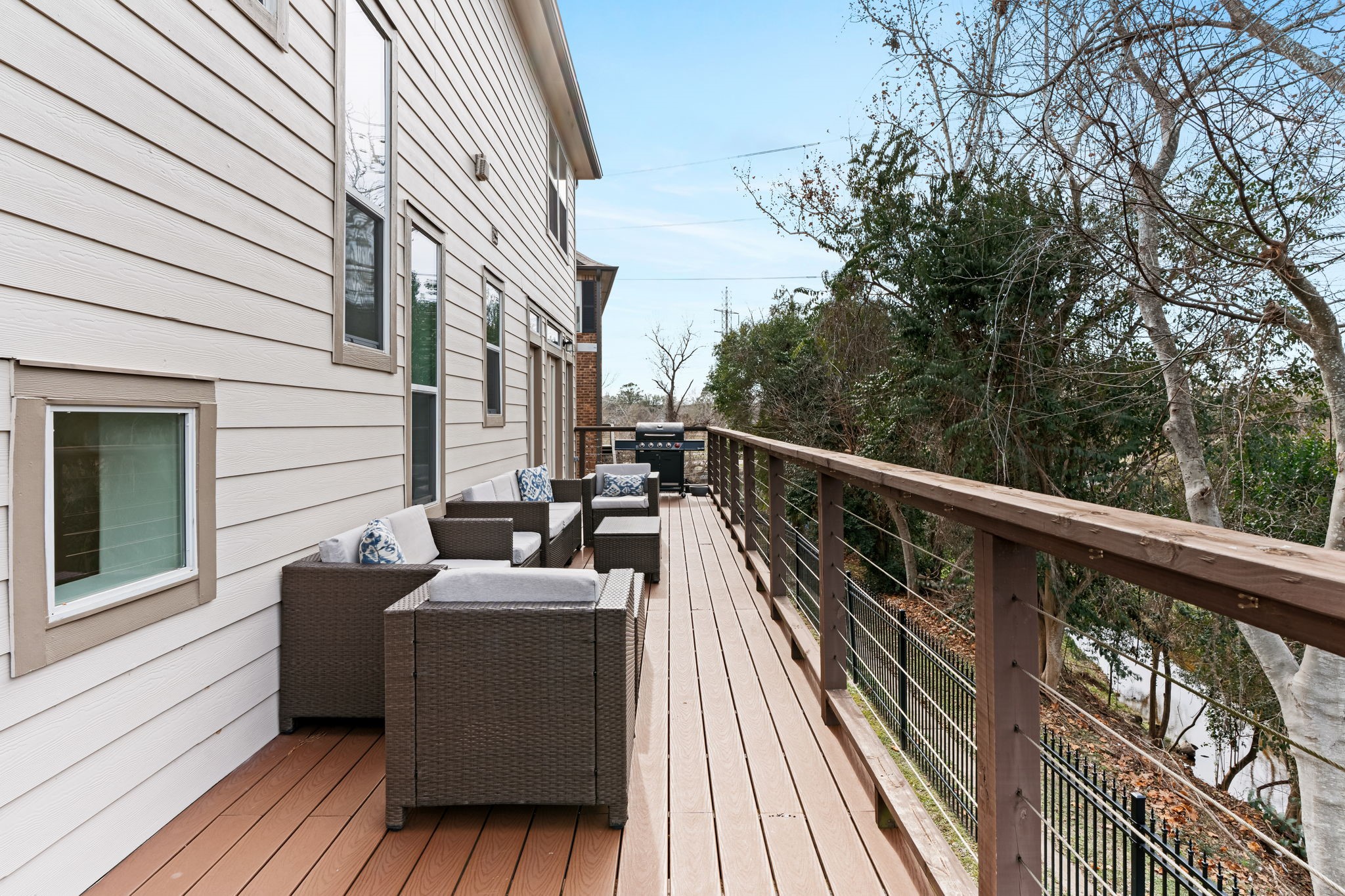 1846 Stacy Crest Houston, TX 77008 - Photo 28 of 32 a view of a balcony with furniture and wooden floor