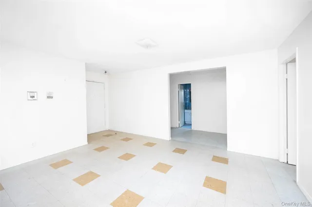 a view of a bedroom with a bed