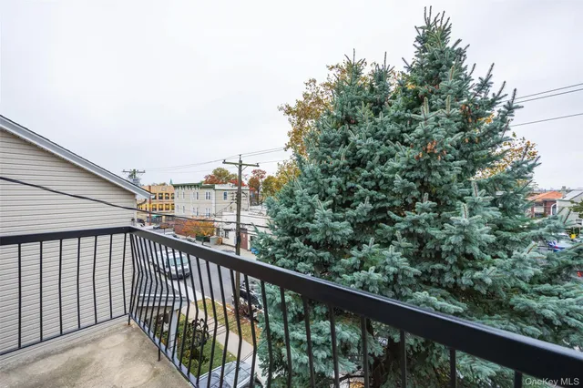 a view of a balcony with an outdoor space