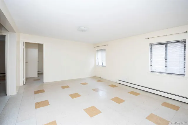 a view of a bedroom with a bed