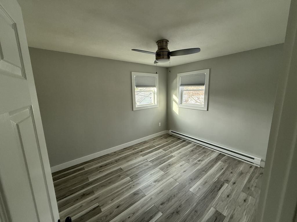 12 Hunnewell Road, Unit 2R Worcester, MA 01606 - Photo 5 of 13 a view of an empty room and window