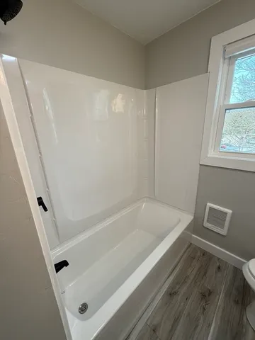 a bathroom with a bathtub