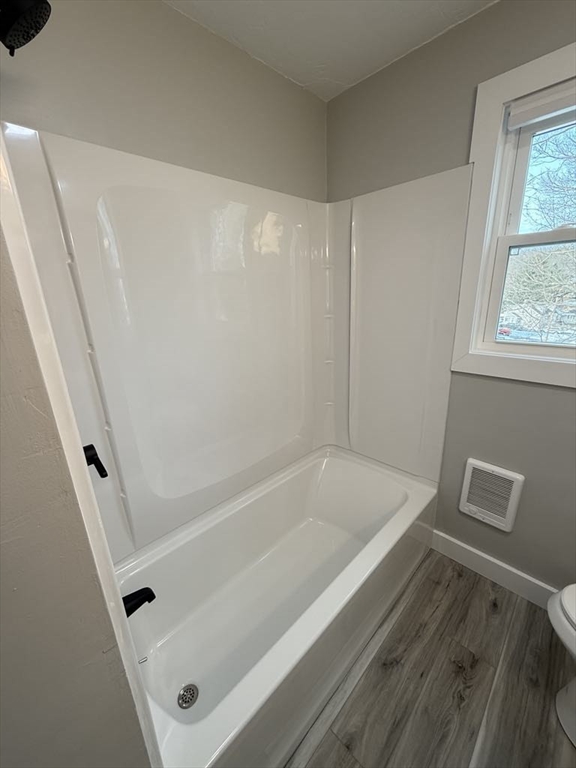 12 Hunnewell Road, Unit 2R Worcester, MA 01606 - Photo 10 of 13 a bathroom with a bathtub
