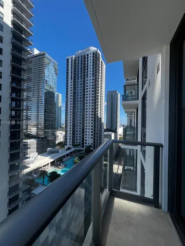 a view of balcony with furniture