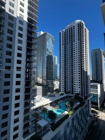 a front view of a building with glass windows