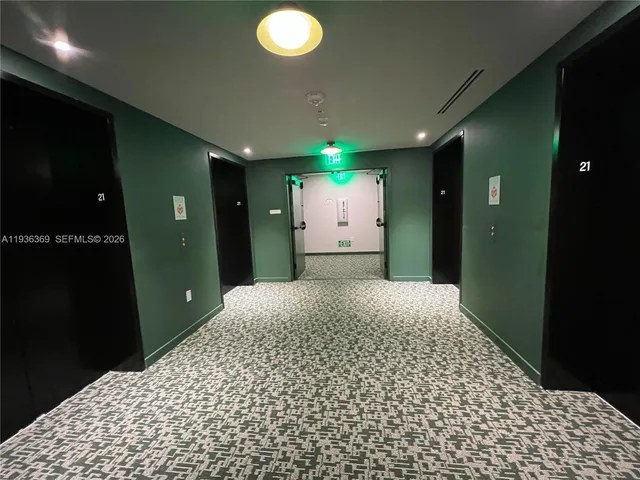 a view of a swimming pool with a lounge chairs