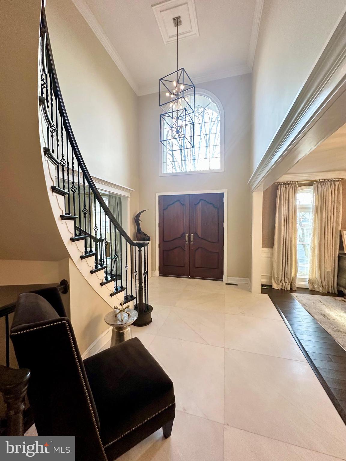 13701 Goosefoot Terrace Rockville, MD 20850 - Photo 3 of 16 a view of entryway and hall with wooden floor