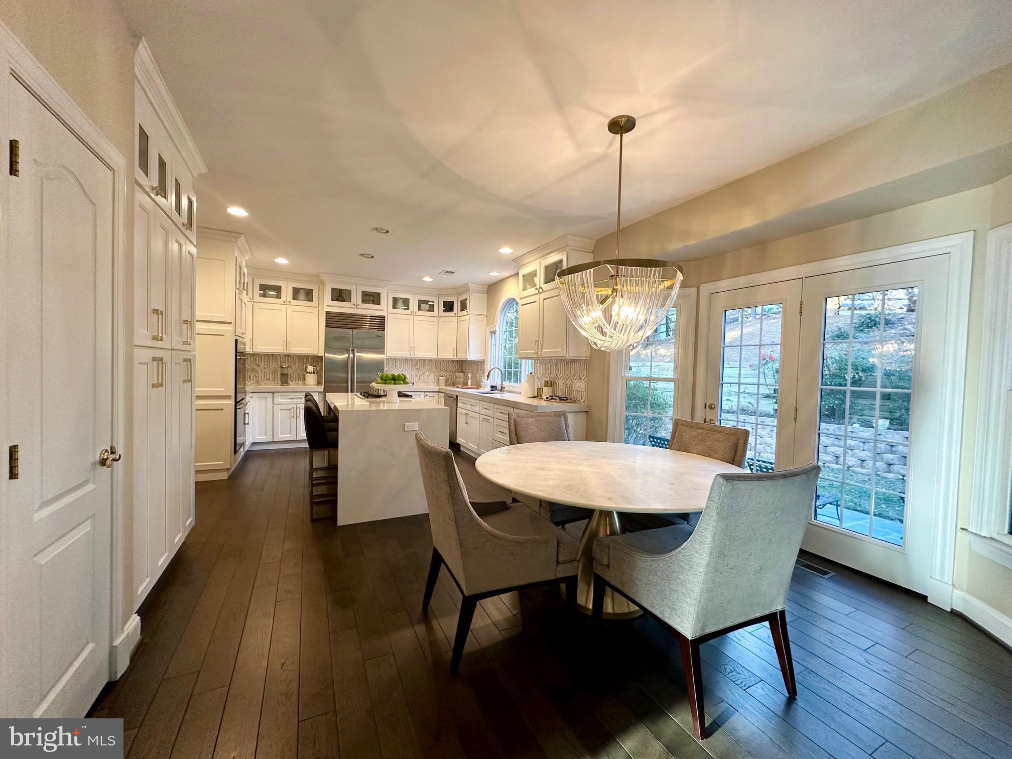 13701 Goosefoot Terrace Rockville, MD 20850 - Photo 8 of 16 a dining room with furniture and window