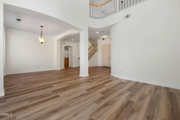a view of entryway with wooden floor