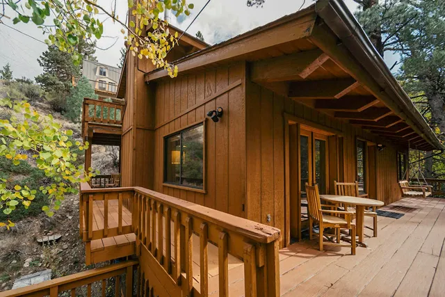 a view of a chair and table in the balcony