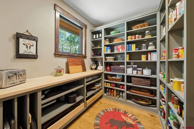 a room with furniture and a book shelf