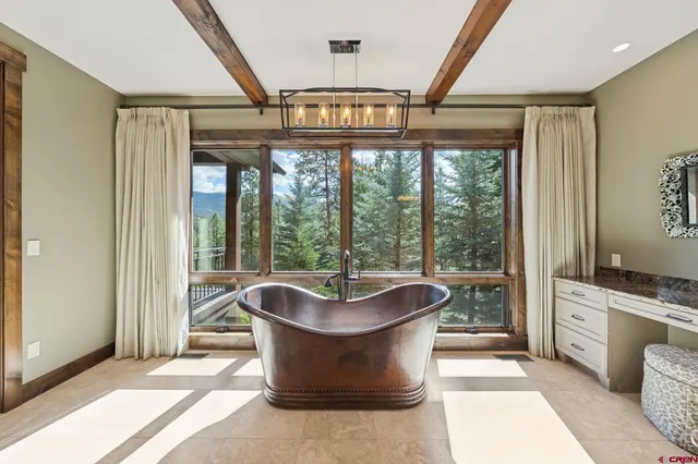 a living room with couch and a window