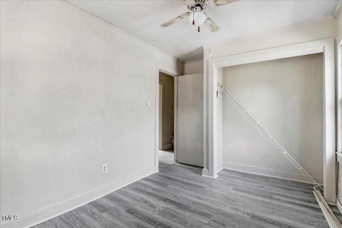201 East Hooks River Road Goldsboro, NC 27530 - Photo 11 of 16 a view of an empty room with wooden floor