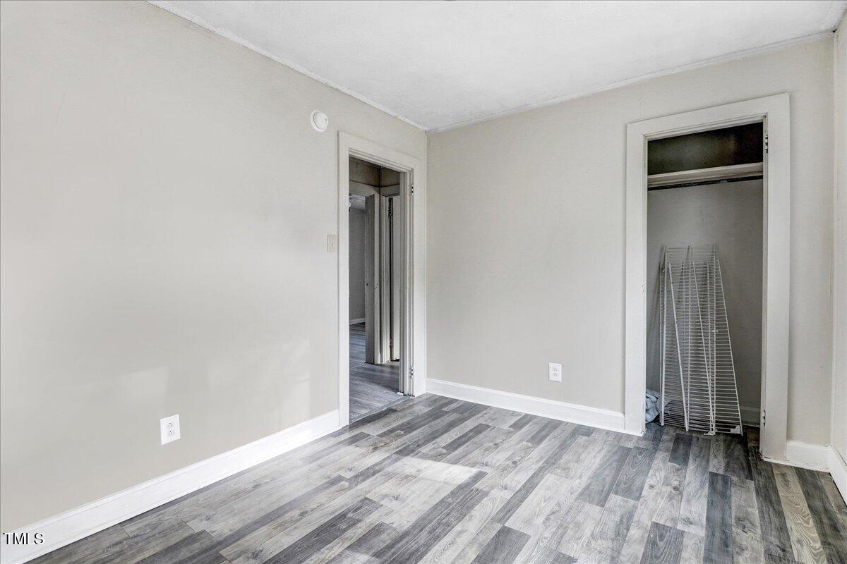 201 East Hooks River Road Goldsboro, NC 27530 - Photo 16 of 16 an empty room with closet and a window