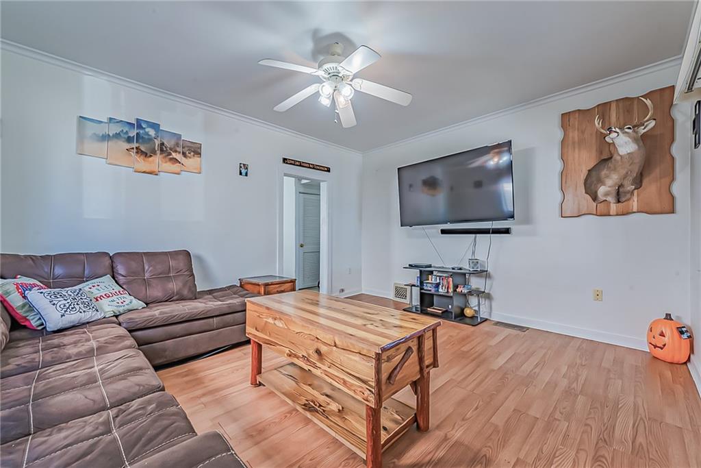 118 Ave A Latrobe, PA 15650 - Photo 2 of 25 a living room with furniture and a flat screen tv