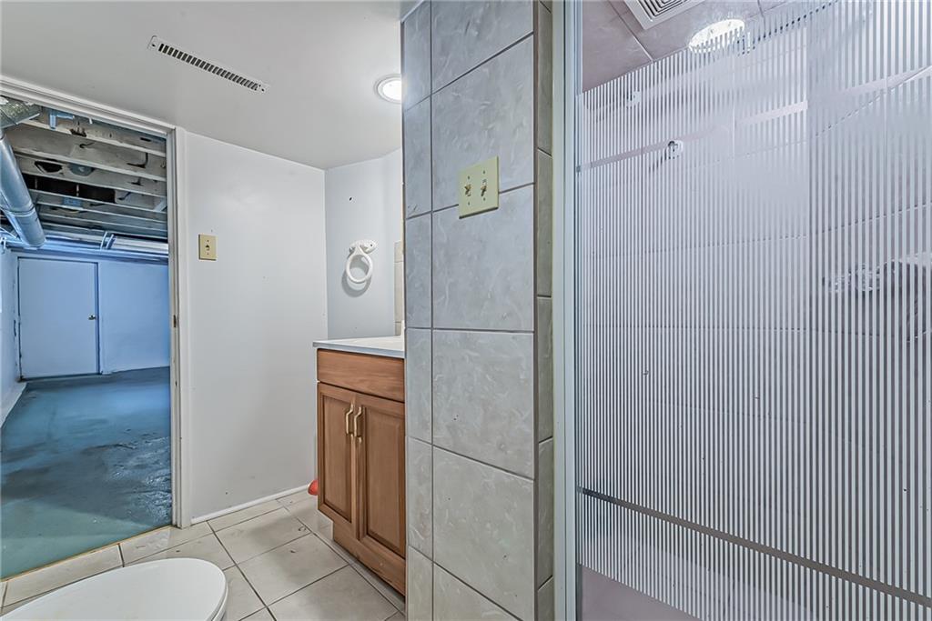 118 Ave A Latrobe, PA 15650 - Photo 19 of 25 a bathroom with a shower and closet