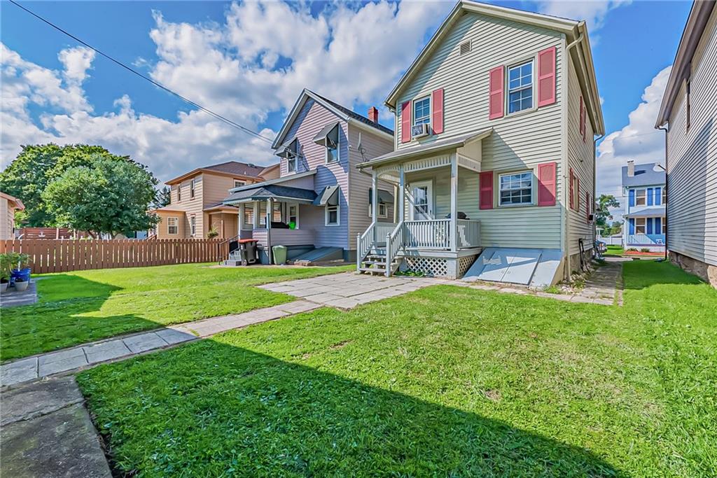 118 Ave A Latrobe, PA 15650 - Photo 20 of 25 a front view of a house with garden