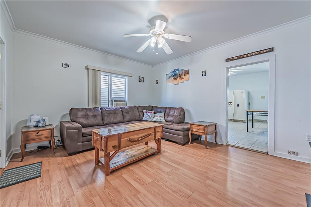 118 Ave A Latrobe, PA 15650 - Photo 3 of 25 a living room with furniture and a chandelier
