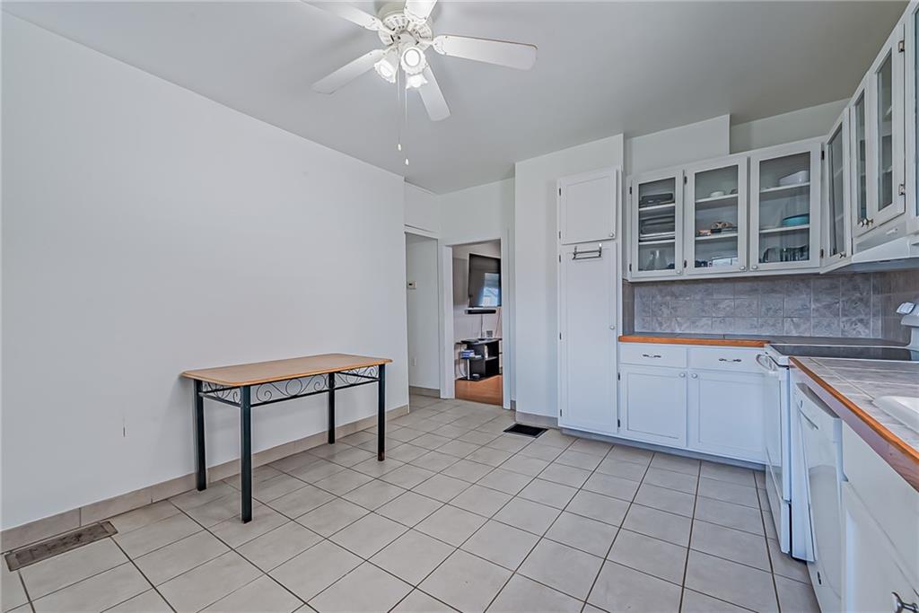 118 Ave A Latrobe, PA 15650 - Photo 7 of 25 a view of cabinets and window