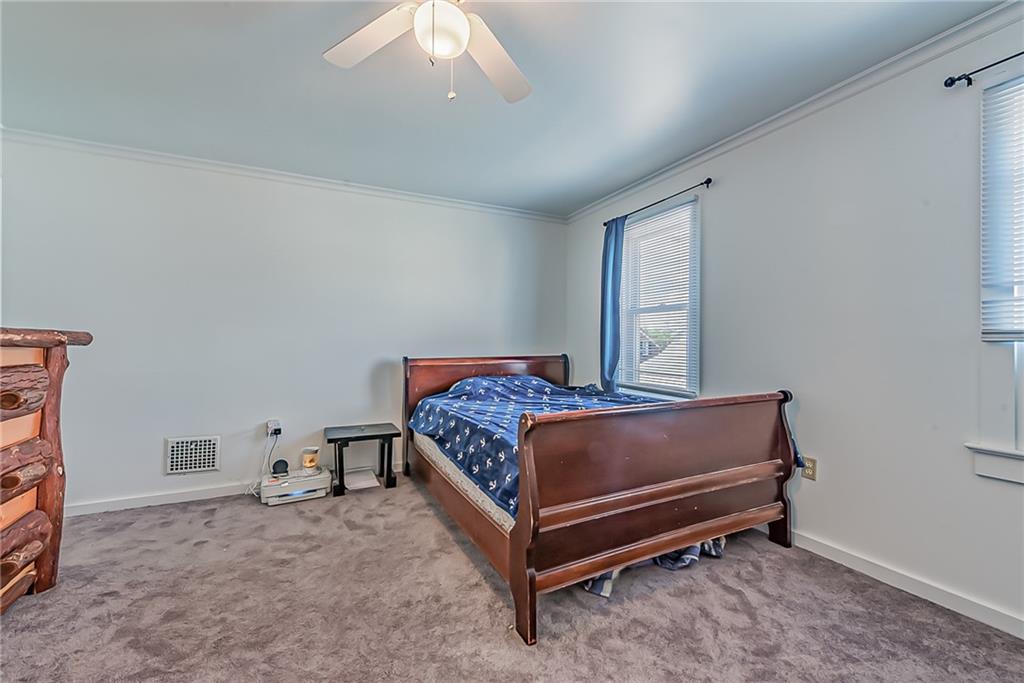 118 Ave A Latrobe, PA 15650 - Photo 10 of 25 a bedroom with a bed and a window