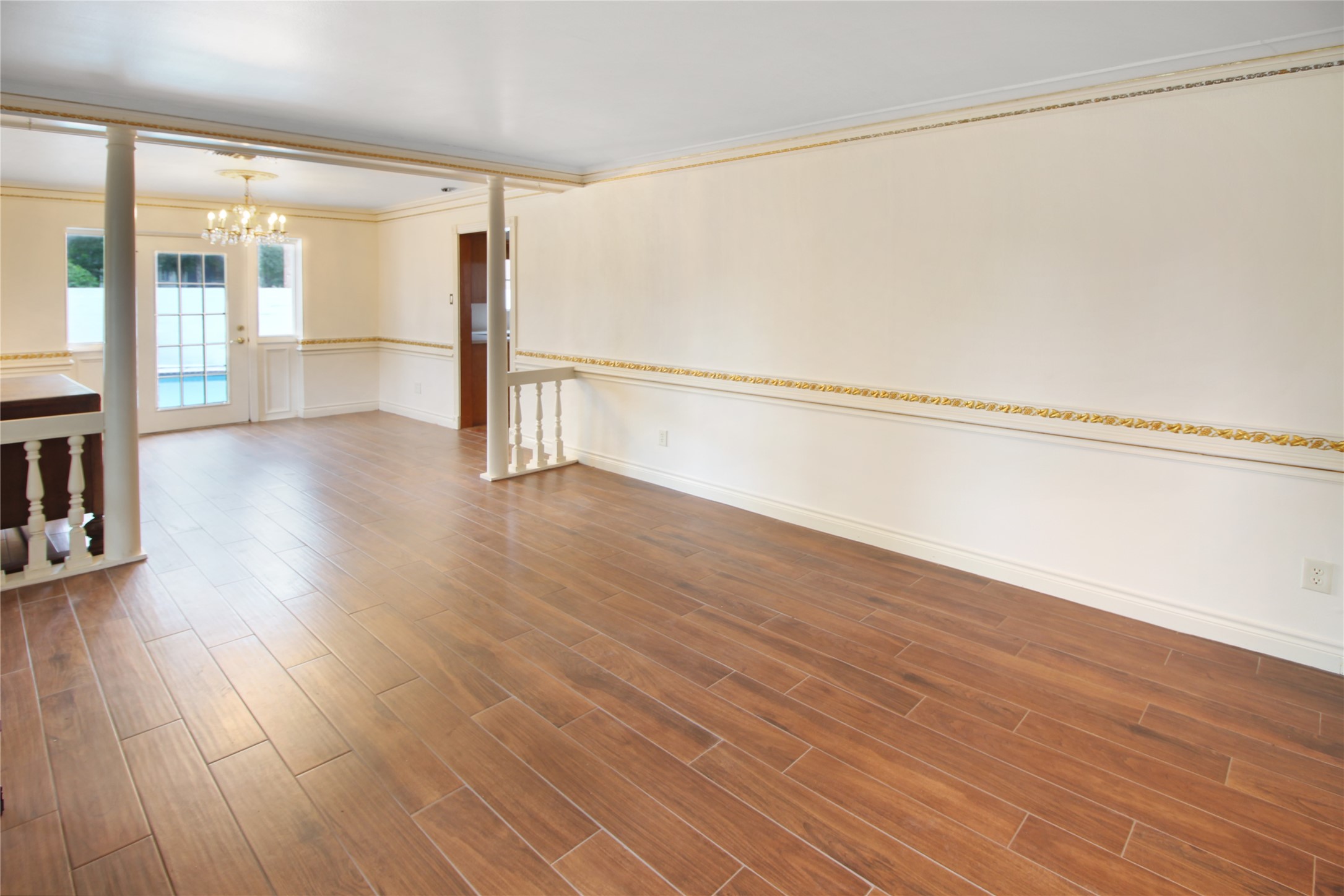 7531 Ralick Court Spring, TX 77379 - Photo 29 of 42 a view of empty room with wooden floor and fan
