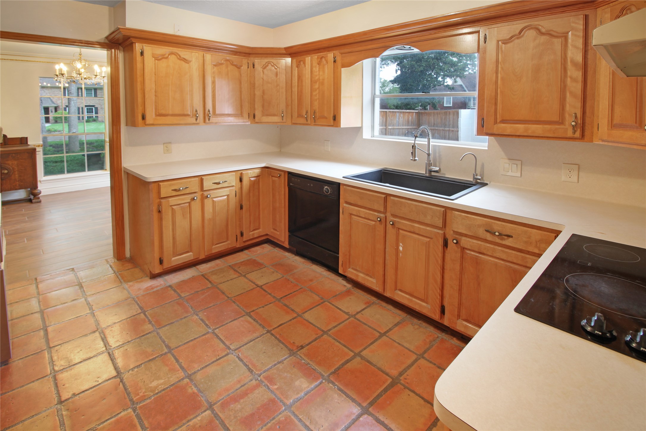 7531 Ralick Court Spring, TX 77379 - Photo 4 of 42 a kitchen with a sink cabinets and window