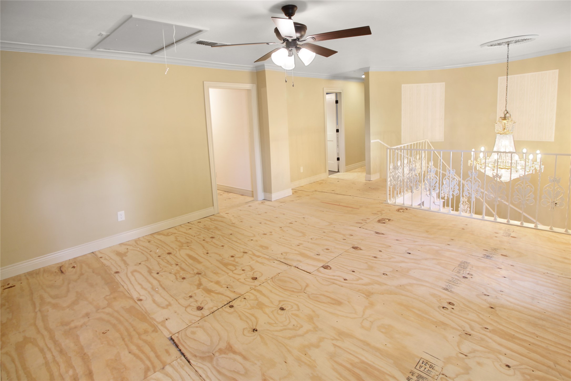7531 Ralick Court Spring, TX 77379 - Photo 7 of 42 a view of a bedroom with wooden floor and a ceiling fan