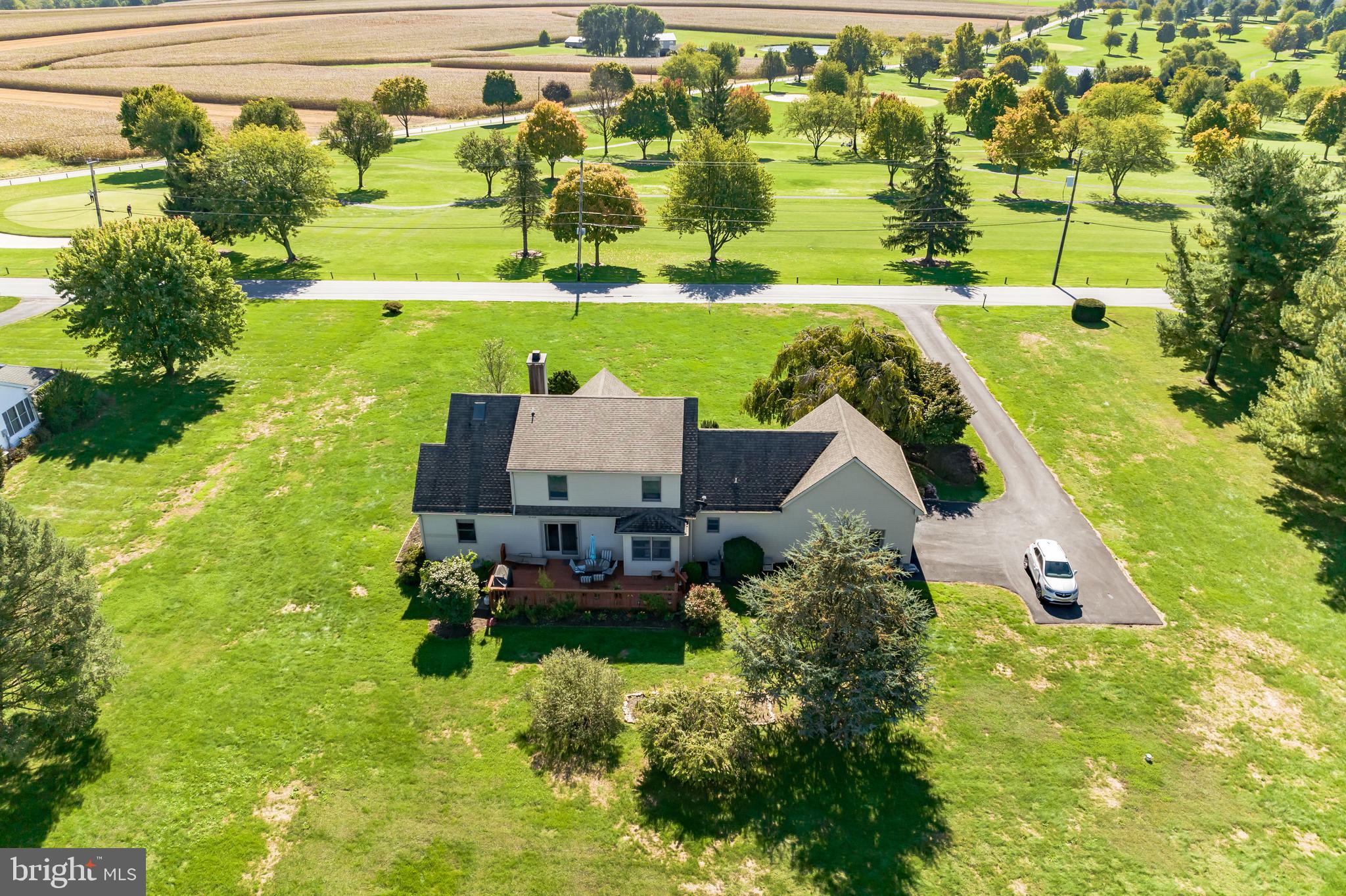 251 Schoff Road Atglen, PA 19310 - Photo 38 of 43 a aerial view of a house with a garden and swimming pool