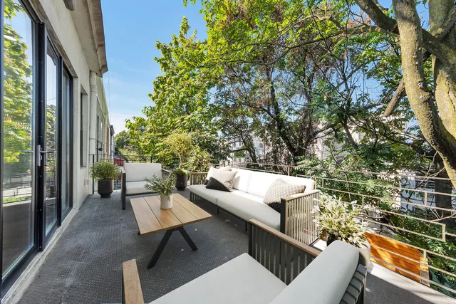 a outdoor living space with furniture