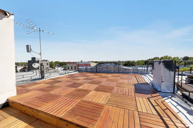 a bathroom with a toilet a sink and bathtub