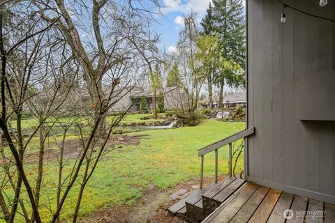 a view of swimming pool from a balcony