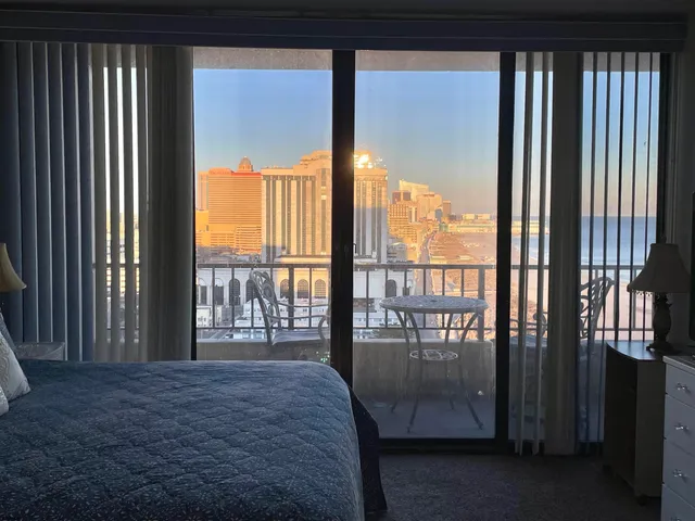 a view of a room with a large window