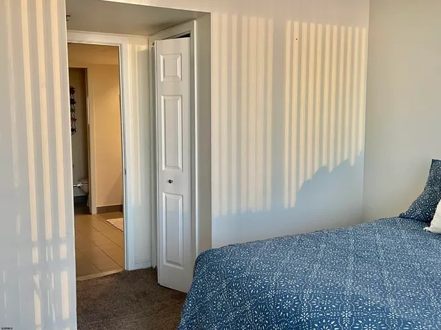 a view of bedroom and bathroom