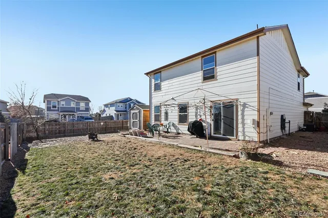 a view of a house with large outdoor space