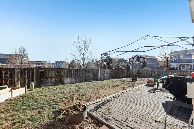a view of a backyard with a patio