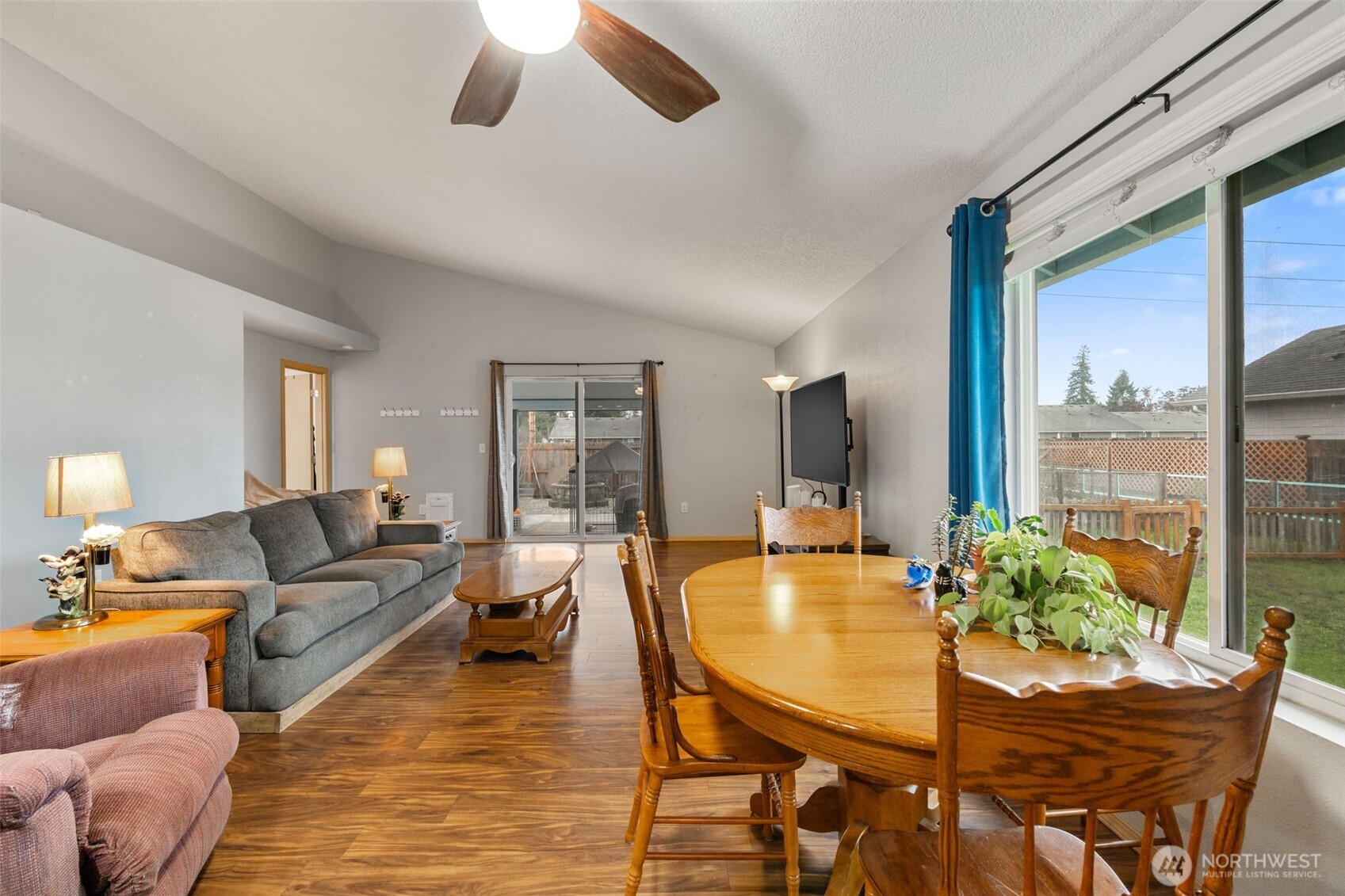 6321 199th Loop Southwest Rochester, WA 98579 - Photo 15 of 38 a living room with furniture and a large window