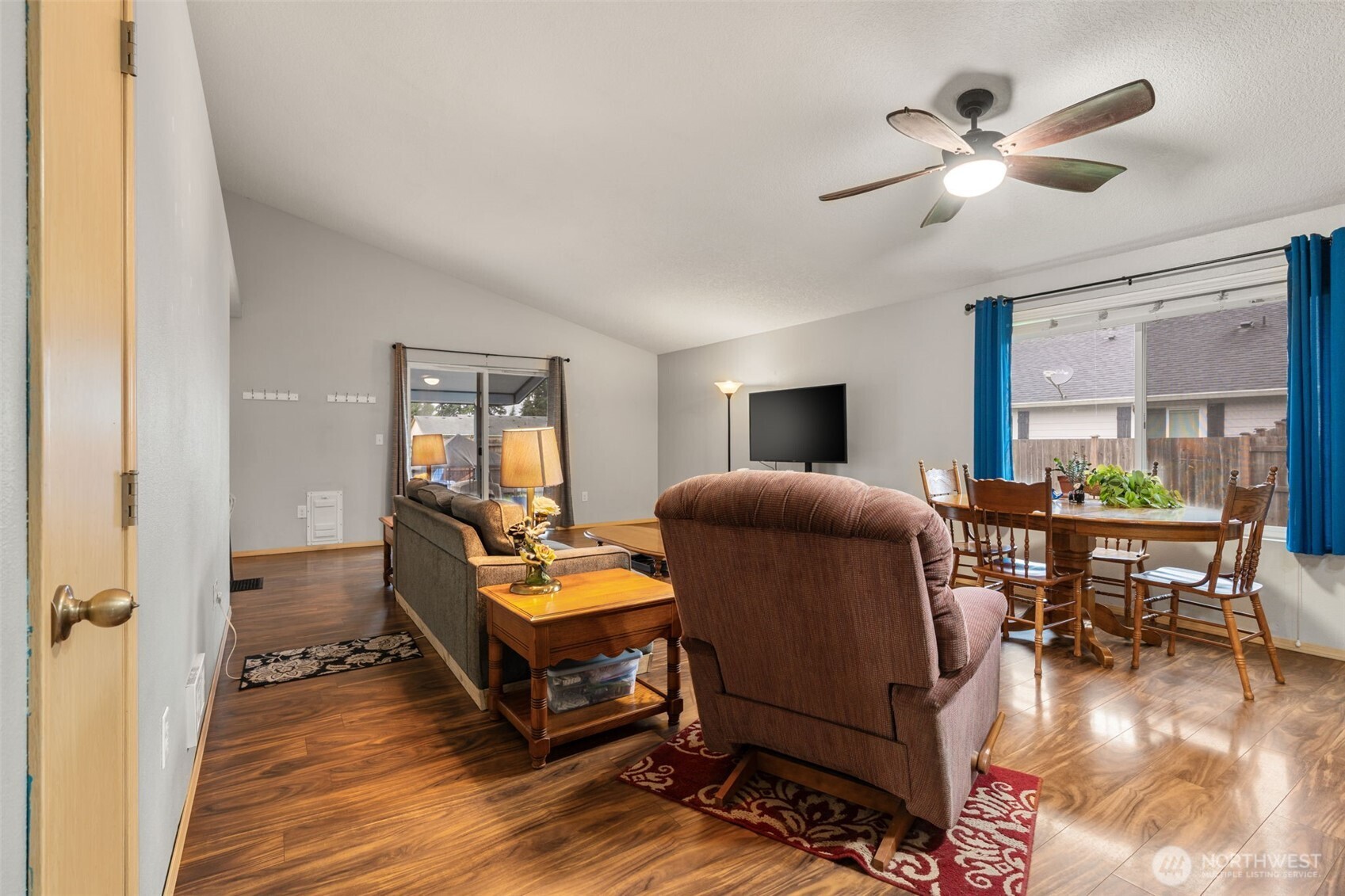 6321 199th Loop Southwest Rochester, WA 98579 - Photo 17 of 38 a living room with furniture and wooden floor