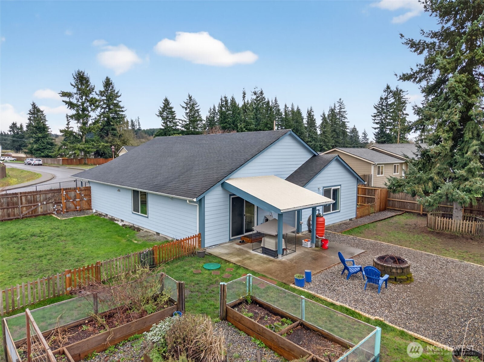 6321 199th Loop Southwest Rochester, WA 98579 - Photo 33 of 38 a view of house with outdoor seating space