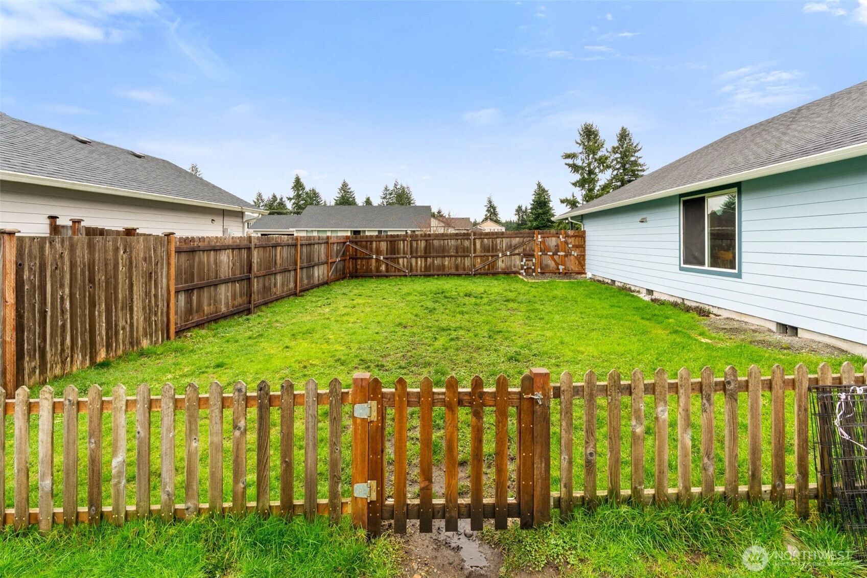 6321 199th Loop Southwest Rochester, WA 98579 - Photo 34 of 38 a view of a backyard with plants