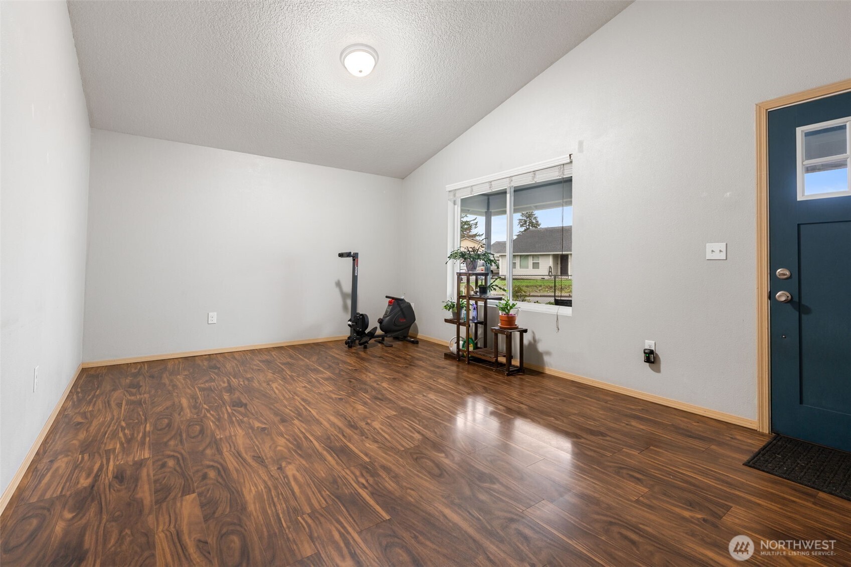 6321 199th Loop Southwest Rochester, WA 98579 - Photo 7 of 38 a view of empty room with wooden floor
