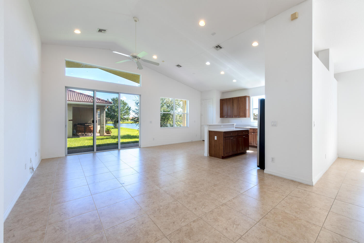 754 Aberfoyle Avenue Fort Pierce, FL 34947 - Photo 8 of 19 a view of a kitchen with a sink and a fireplace