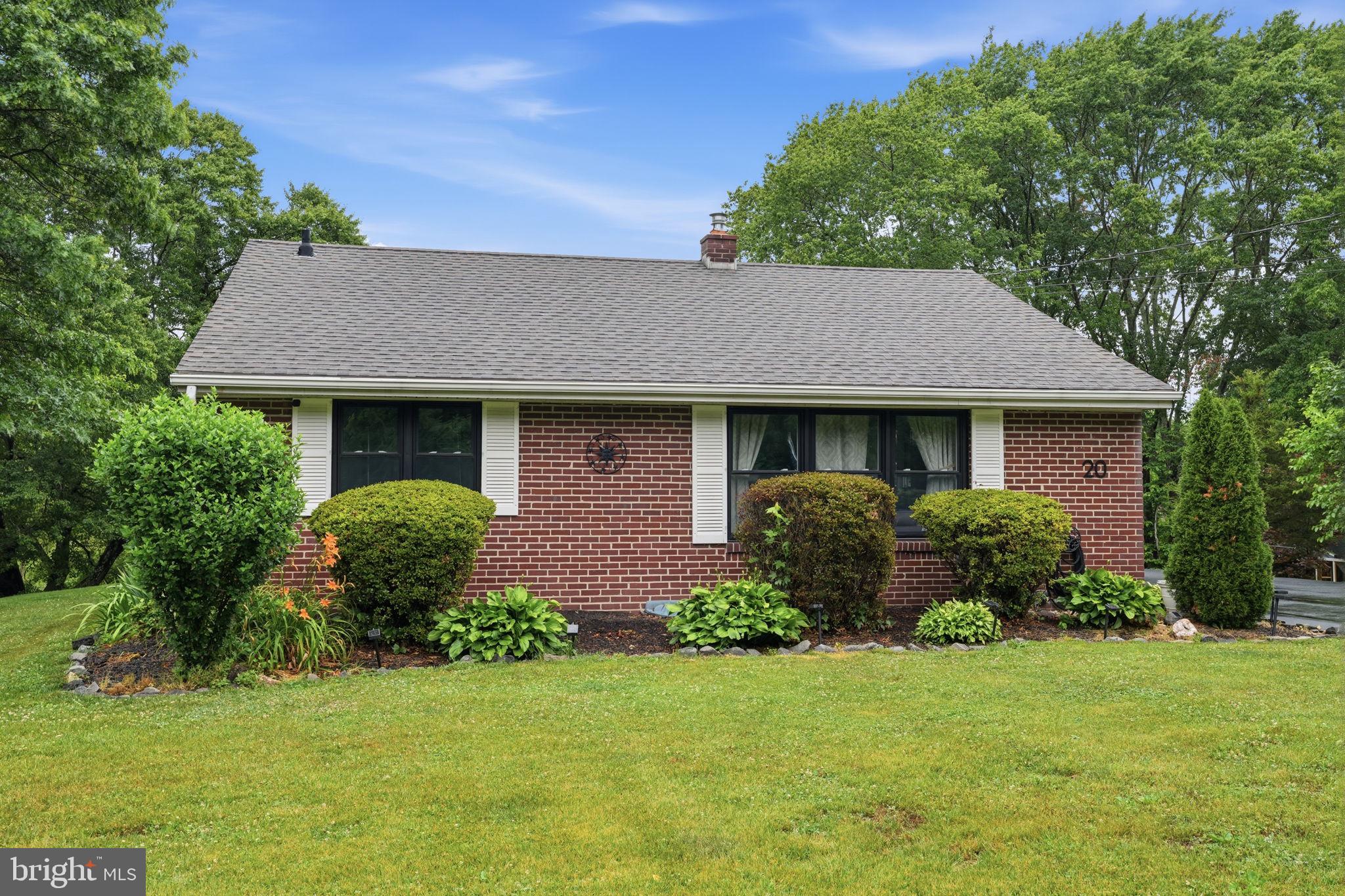 20 Poplar Road Ringoes, NJ 08551 - Photo 2 of 44 Charming brick home with lush greenery.