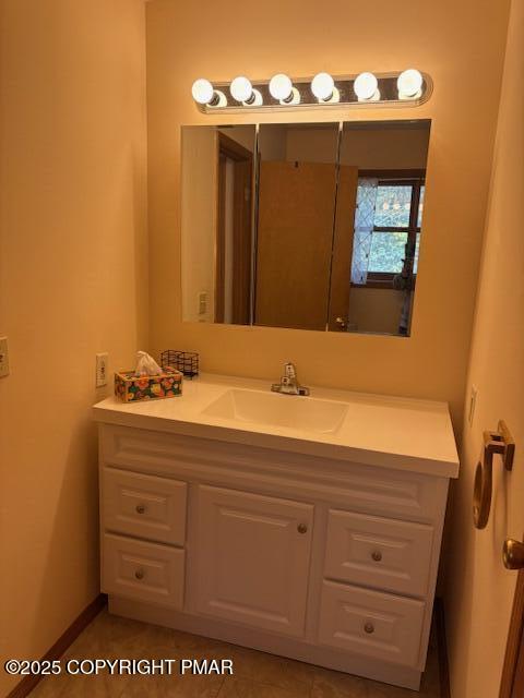 893 Millcreek Road Newfoundland, PA 18445 - Photo 26 of 31 a bathroom with a sink mirror and vanity